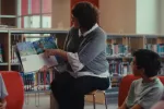 Librarian reads to children