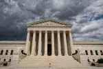 U.S. Supreme Court with ominous skies