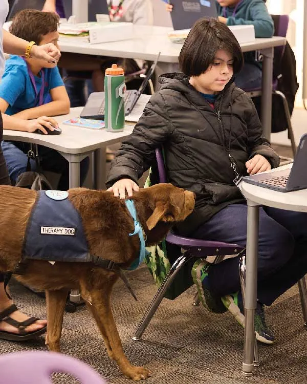 Hotch assisting a student.