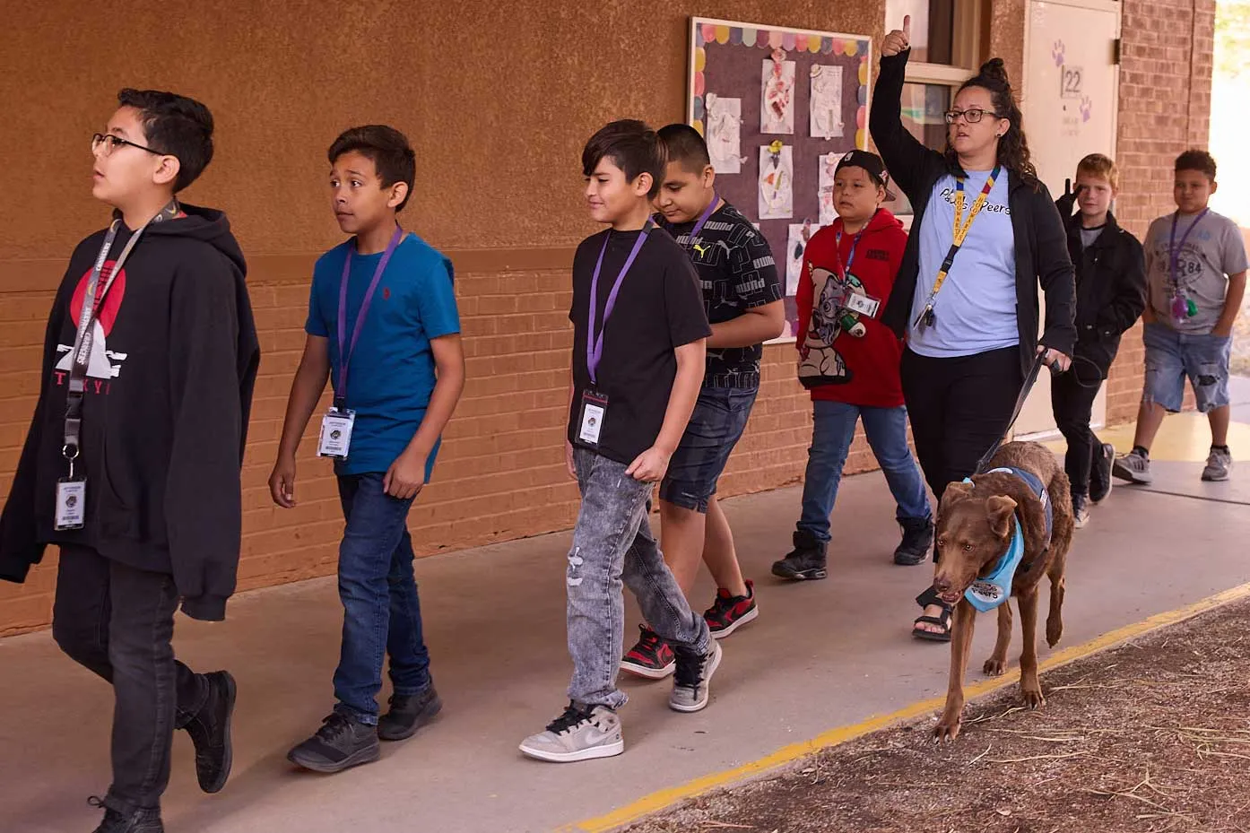 Lindsay Dominguez and Hotch walk to class