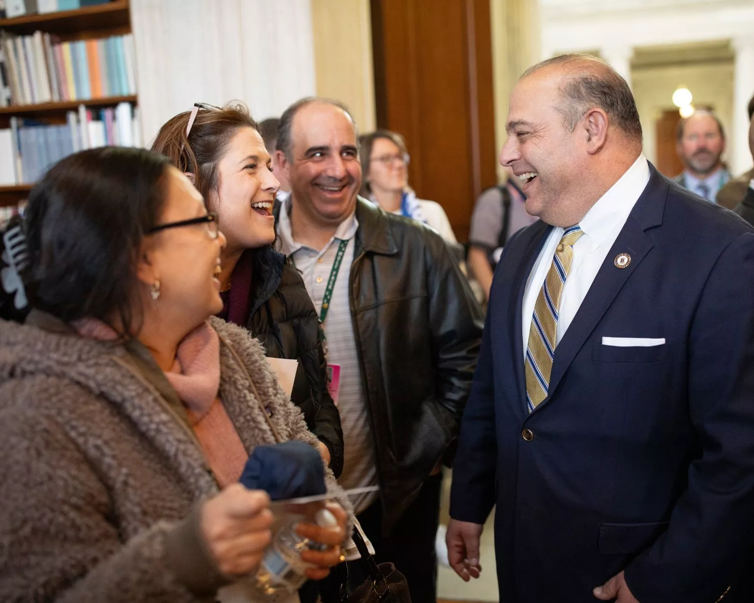 NEARI members talking with a legislator on Lobby Day 2024.