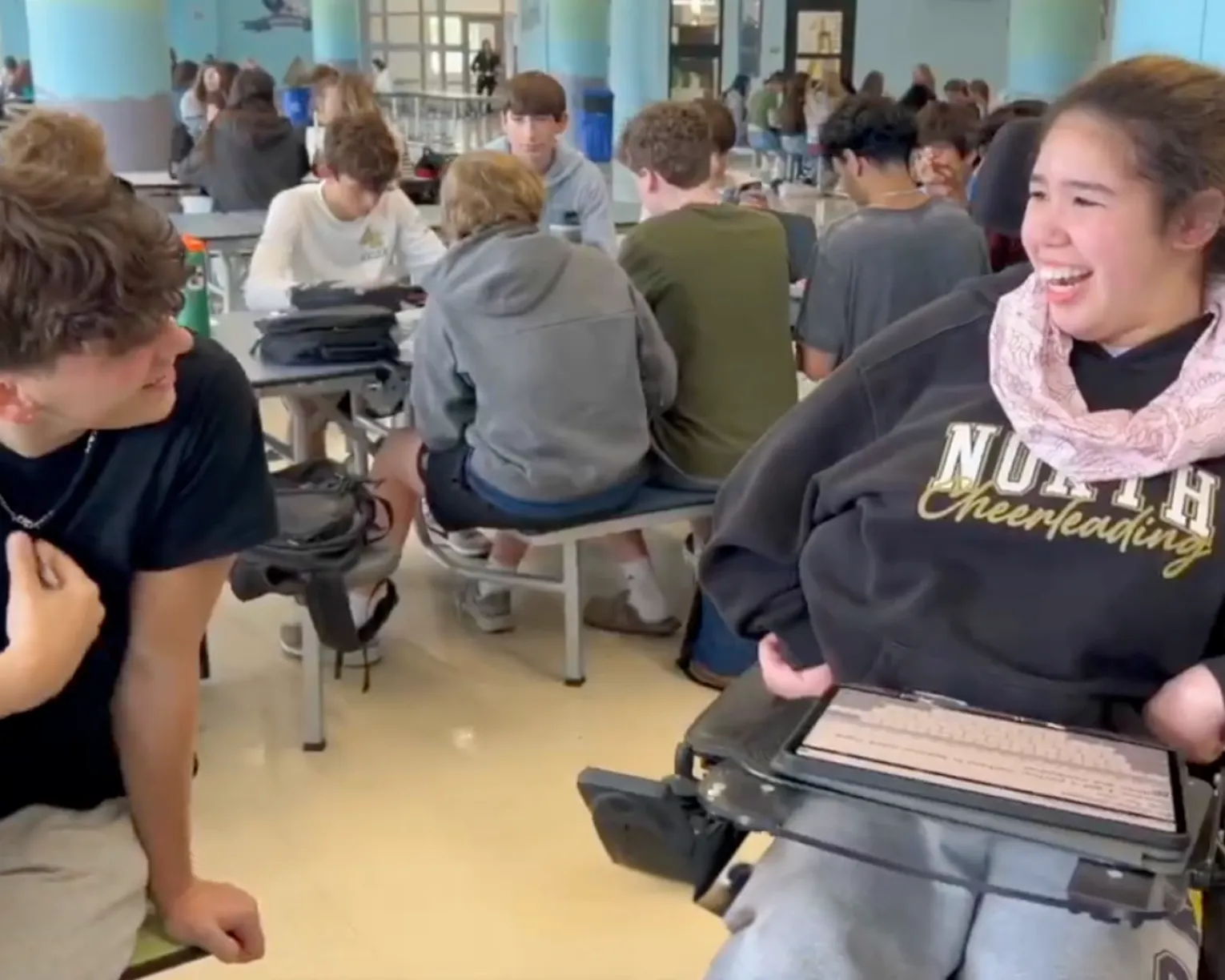 Break the Myth video still of two students smiling at each other
