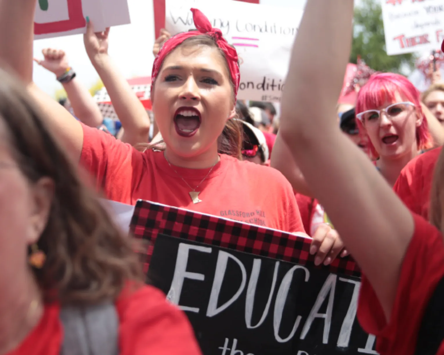 teacher in red for ed advocating for students