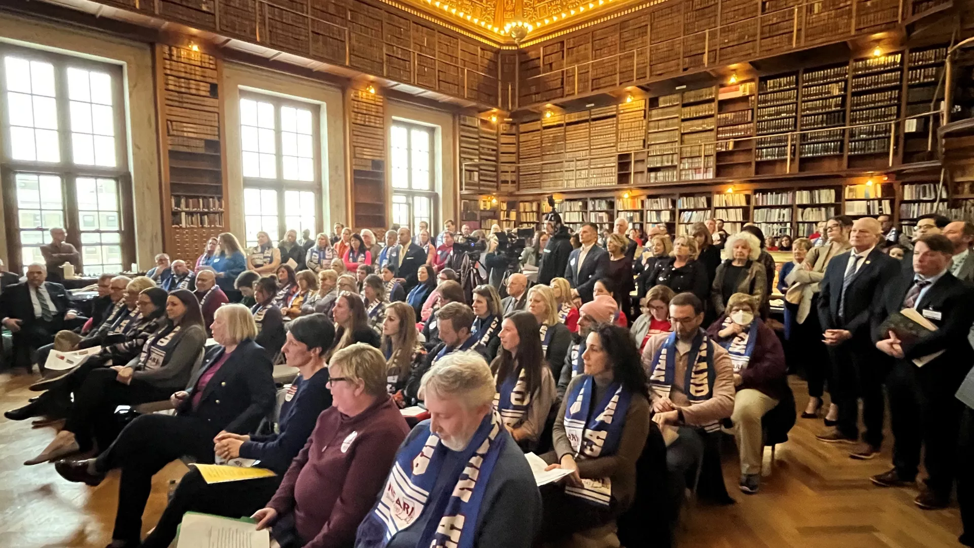 NEARI announces legislative priorities to a packed gathering at the Statehouse Library. 