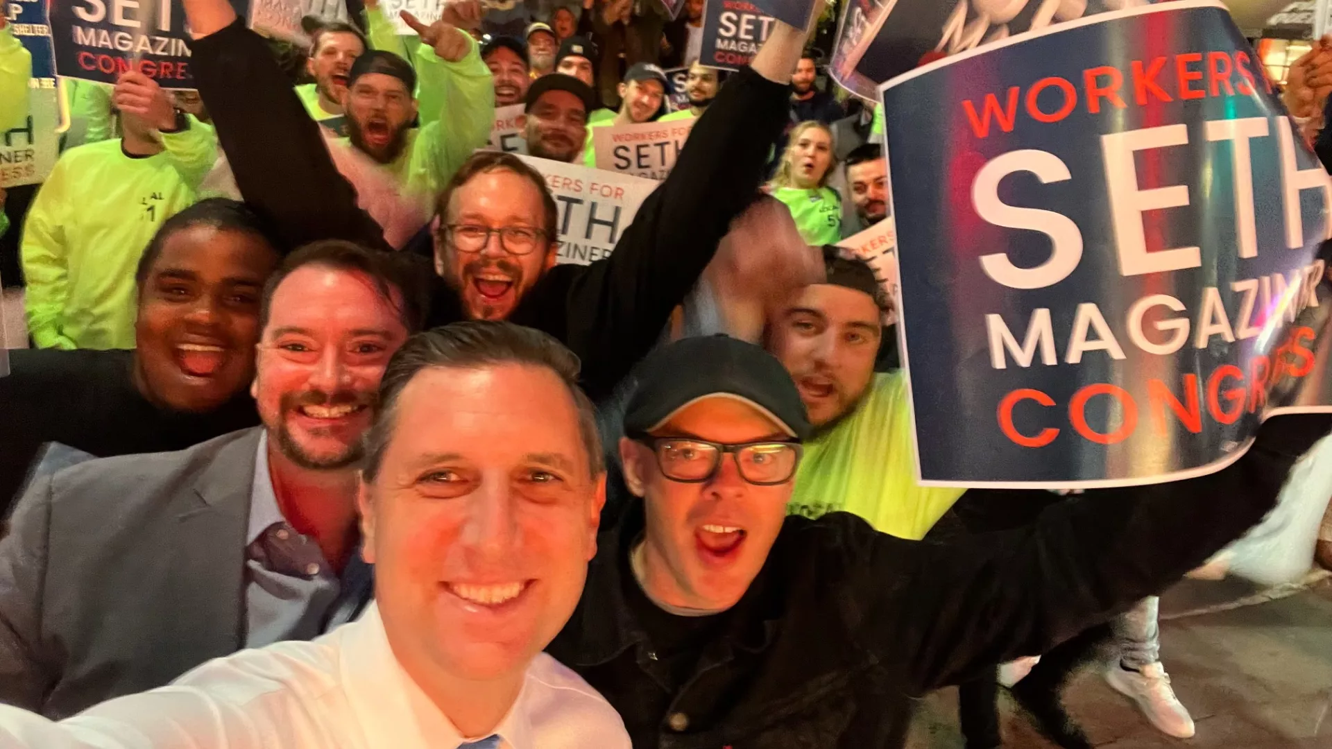 Seth Magaziner with union members at a rally for his election