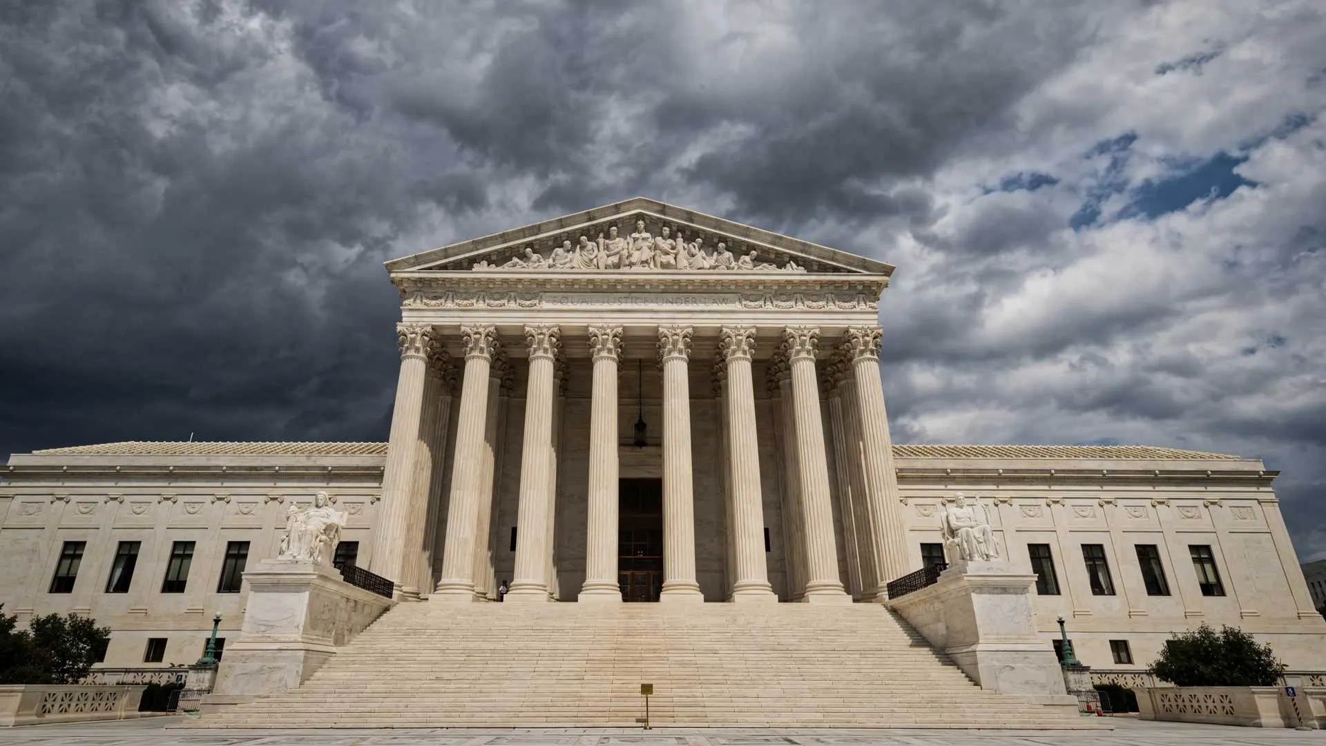 U.S. Supreme Court with ominous skies