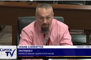 Alex Lucini gives testimony at the Statehouse in favor of school meals