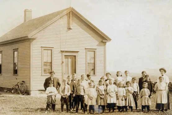 students and teacher outside District No. 4 school in Little Compton, Rhode Island
