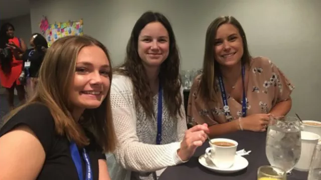 Three aspiring educator members pause for a picture at an NEA Aspiring Educator conference.