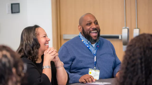 ESPs laughing together at a professional development event.