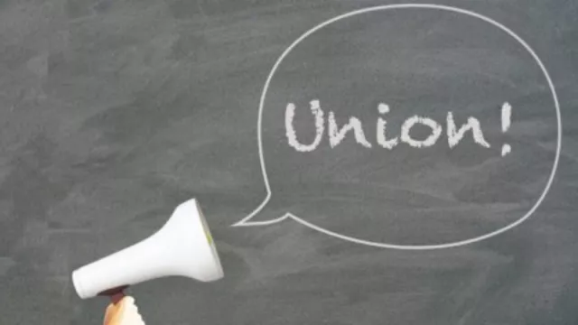 megphone against blackboard with word "Union!"
