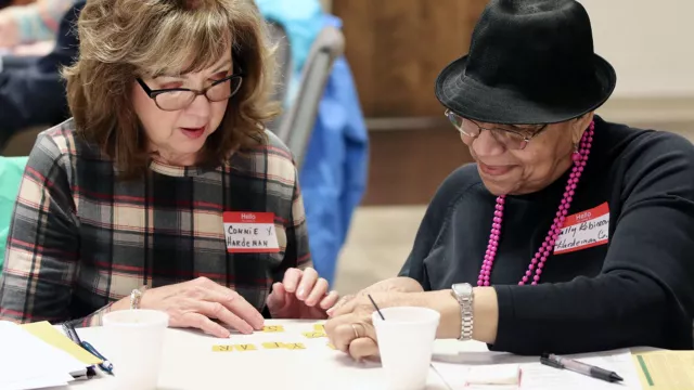 NEA-Retired members attend a meeting
