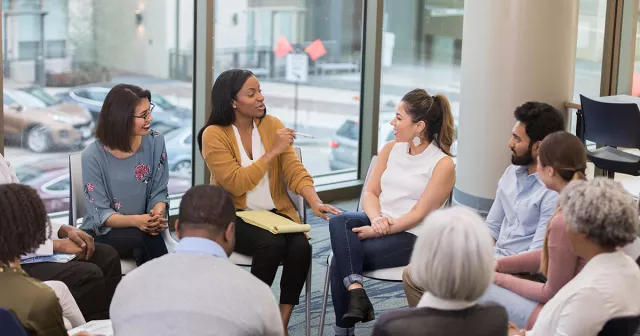 photos of educators in a circle collaborating in a meeting
